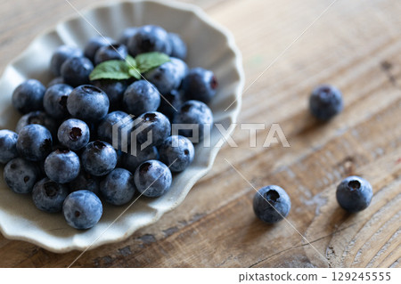 blueberries on a plate blueberries on a plate 129245555