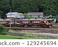 A 7200 series train approaches Myokenguchi Station on the Nose Electric Railway 129245694