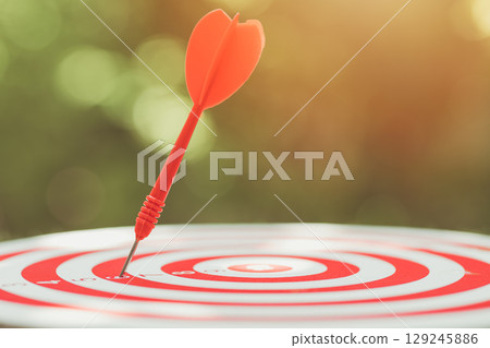 arrow dart missing center target, business lost goal or aim objective fail concept arrow dart missing center target, business lost goal or aim objective fail concept 129245886