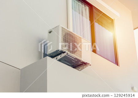 clean new modern outdoor unit air compressor, Air Conditioner for cooling house in summer season clean new modern outdoor unit air compressor, Air Conditioner for cooling house in summer season 129245914