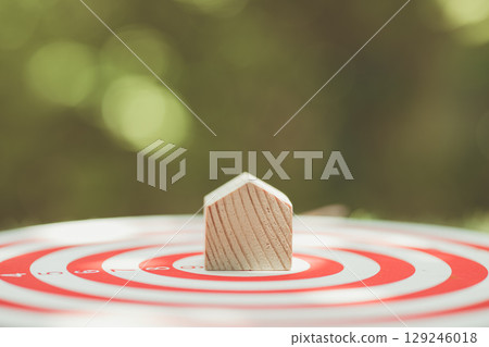 home at the center of target for property investment goal aim in business house owner concept home at the center of target for property investment goal aim in business house owner concept 129246018