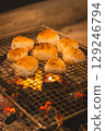 Grilled rice balls on the hearth 129246794