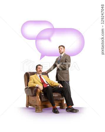 Bold poster of two men in suits with large speech bubbles symbolizing conversation 129247048