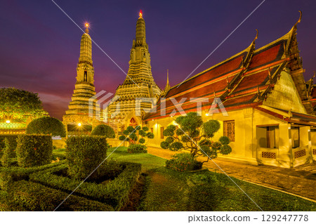 Chao Phraya River Cruise Boat with Temple of the Dawn, Wat Arun, at Sunset in Background, Horizontal Chao Phraya River Cruise Boat with Temple of the Dawn, Wat Arun, at Sunset in Background, Horizontal 129247778