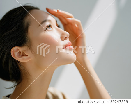 A neat profile of a woman surrounded by natural light A neat profile of a woman surrounded by natural light 129247859