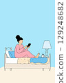 Woman Using Tablet in Bed 129248682
