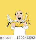 Surprised Man Holding a Giant Banana 129248692