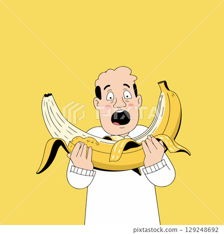 Surprised Man Holding a Giant Banana 129248692