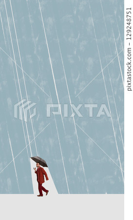 Collage of man in red coat walking under umbrella with heavy rain and large blue copy space 129248751