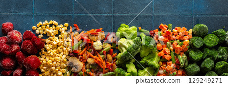 Colorful and fresh banner design featuring frozen fruits and vegetables, highlighting the preservation of organic produce for winter and promoting a healthy lifestyle Colorful and fresh banner design featuring frozen fruits and vegetables, highlighting the preservation of organic produce for winter and promoting a healthy lifestyle 129249271