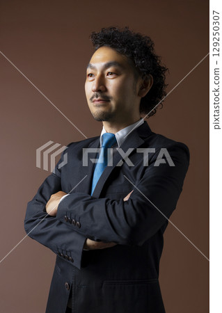 Bearded businessman in a suit 129250307