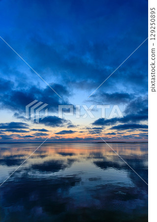 A fantastic sunset reflected on Lake Saroma A fantastic sunset reflected on Lake Saroma 129250895