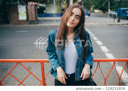 Woman in a blue jacket Woman in a blue jacket 129252959