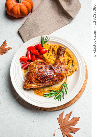 Autumn meal: roasted chicken quarter with mashed pumpkin Autumn meal: roasted chicken quarter with mashed pumpkin 129253060