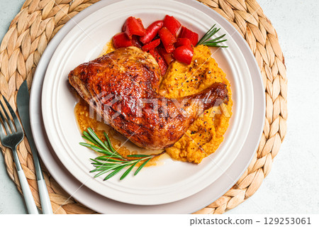 Autumn meal: roasted chicken quarter with mashed sweet potato Autumn meal: roasted chicken quarter with mashed sweet potato 129253061
