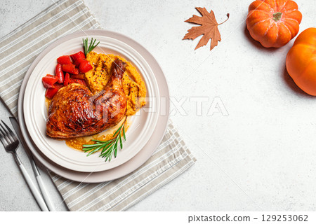 Autumn meal: roasted chicken quarter with mashed sweet potato Autumn meal: roasted chicken quarter with mashed sweet potato 129253062