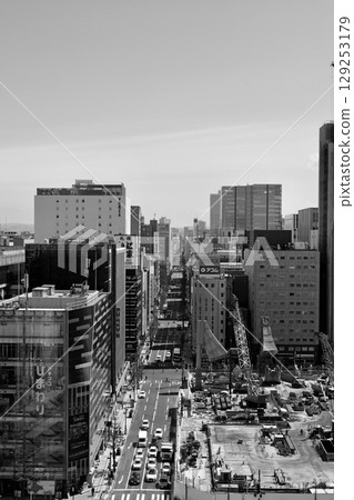 "Sapporo Stellar Place" seen from the rooftop of "Sapporo Station South Exit" in black and white 129253179