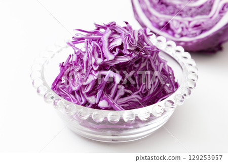 Shredded purple cabbage on a white background Shredded purple cabbage on a white background 129253957