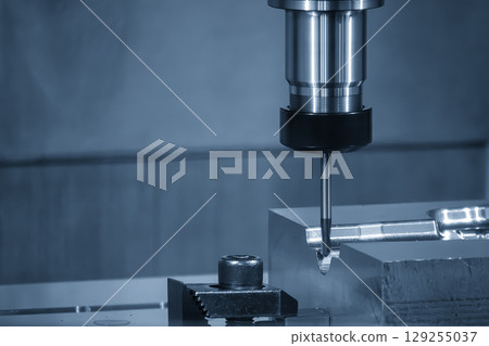 The CNC milling machine finish cut the mold parts by solid ball nose end mill tool in the blue tone. The CNC milling machine finish cut the mold parts by solid ball nose end mill tool in the blue tone. 129255037