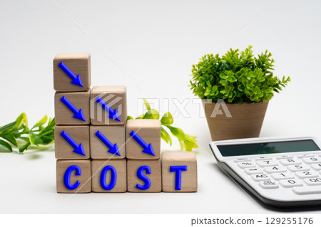 Image of a calculator and cost reduction 129255176