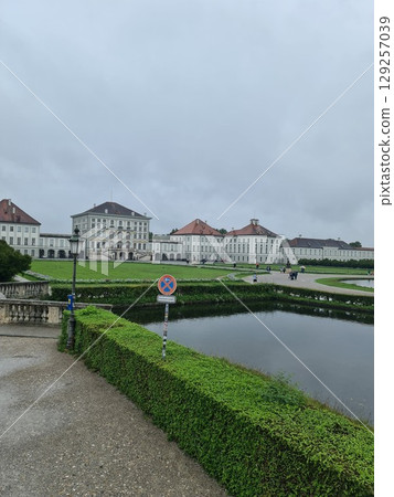 Munich, Germany - July 26, 2025: Nymphenburg Palace, a Baroque palace situated in Munich's western district Neuhausen-Nymphenburg, in Bavaria Munich, Germany - July 26, 2025: Nymphenburg Palace, a Baroque palace situated in Munich's western district Neuhausen-Nymphenburg, in Bavaria 129257039