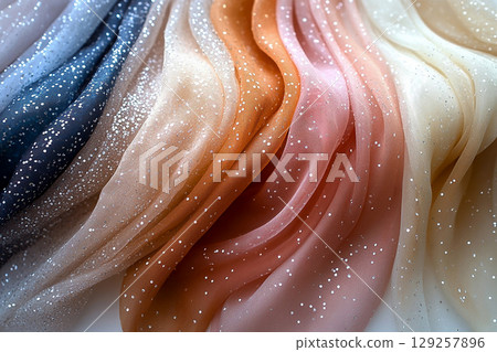 Luxury fabric. Diversity of bridal tulle with crystal embellishments is hanging on the wall. Luxury fabric. Diversity of bridal tulle with crystal embellishments is hanging on the wall. 129257896