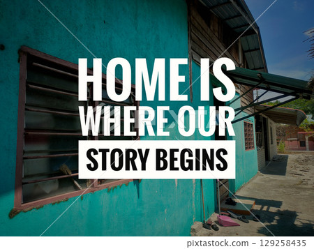 Text Home is where our story begins on a village house background. 129258435