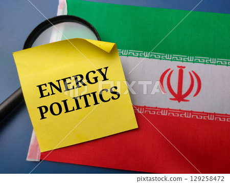 Closeup stickey note with the word ENERGY POLITICS on a iran flag background. Geopolitical concept. Closeup stickey note with the word ENERGY POLITICS on a iran flag background. Geopolitical concept. 129258472