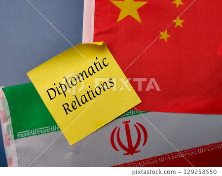 Top view sticky note with the word Diplomatic Relations on a china and india flag background. Top view sticky note with the word Diplomatic Relations on a china and india flag background. 129258550