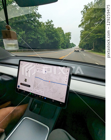 road view from inside electric vehicle 129259475
