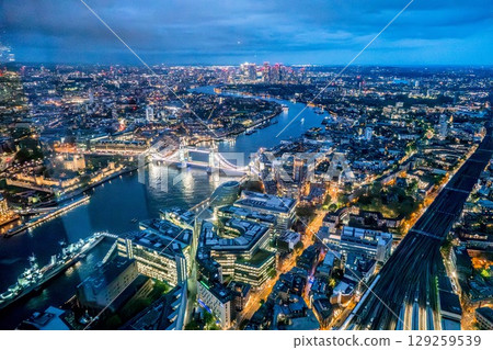 London at night with urban architectures and Tower Bridge 129259539