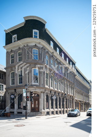 Montreal, Canada - June 05, 2025: skyline and streets of Old Montreal (Vieux) on a sunny day. 129259751
