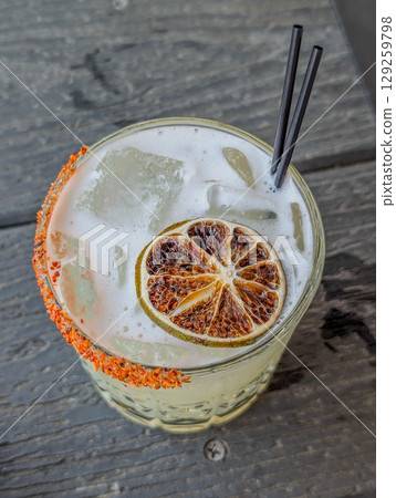 Boozy Refreshing Classic Margarita Cocktail with Salt and Lime Boozy Refreshing Classic Margarita Cocktail with Salt and Lime 129259798