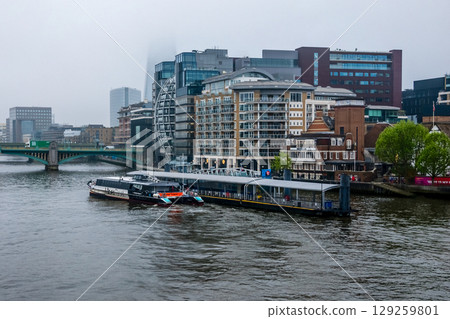 Foggy cityscape of London from Thames river 129259801