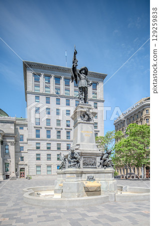 Montreal, Canada - June 05, 2025: skyline and streets of Old Montreal (Vieux) on a sunny day. Montreal, Canada - June 05, 2025: skyline and streets of Old Montreal (Vieux) on a sunny day. 129259838