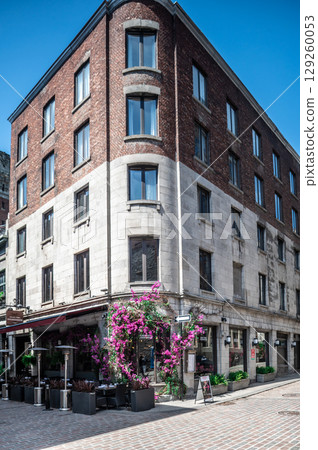 Montreal, Canada - June 05, 2025: skyline and streets of Old Montreal (Vieux) on a sunny day. Montreal, Canada - June 05, 2025: skyline and streets of Old Montreal (Vieux) on a sunny day. 129260053
