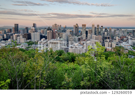 Montreal city skyline panorama at sunset viewed from Mont Royal with urban skyscrapers. Montreal city skyline panorama at sunset viewed from Mont Royal with urban skyscrapers. 129260059