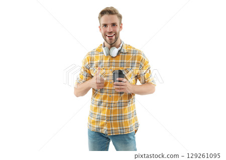 Millennial man hold coffee cup isolated on white. Morning coffee time. Lifestyle concept. Drinking espresso. Relax with music. Thumb up. Man drinking tea. Warm morning. Coffee break at work 129261095