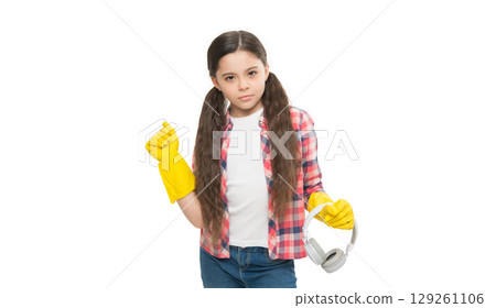 Cleaning routine. Girl wear headphones and gloves for cleaning. Instead of procrastinating try make cleaning little bit easier with fun. Make household more joyful. Listening music and cleaning house Cleaning routine. Girl wear headphones and gloves for cleaning. Instead of procrastinating try make cleaning little bit easier with fun. Make household more joyful. Listening music and cleaning house 129261106