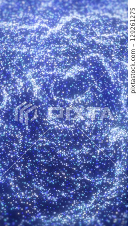 Dense glowing field of small blue and white particles forming an abstract shimmering digital texture 129261275