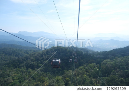 Da Nang, Vietnam Golden Bridge stone hand bridge and mountain view observatory at the Ba Na Hills Sunworld in DaNang Vietnam Da Nang, Vietnam Golden Bridge stone hand bridge and mountain view observatory at the Ba Na Hills Sunworld in DaNang Vietnam 129263809
