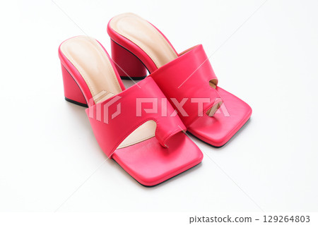 beautiful pink leather heel shoe isolated on white background 129264803