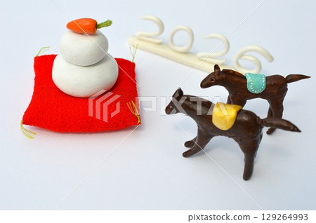 Paper clay horse and Kagami mochi New Year's materials Paper clay horse and Kagami mochi New Year's materials 129264993