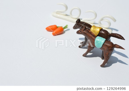 Paper clay horse and carrot New Year's material Paper clay horse and carrot New Year's material 129264996