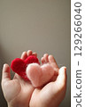Woman's hand with a heart 129266040