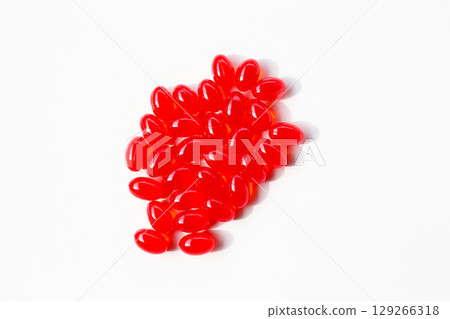 Red softgel Q10 capsules for dietary supplement. 129266318