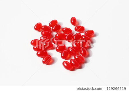 Red softgel Q10 capsules for dietary supplement. 129266319