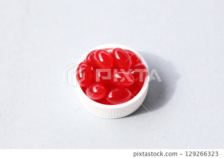 Red softgel Q10 capsules for dietary supplement. Red softgel Q10 capsules for dietary supplement. 129266323