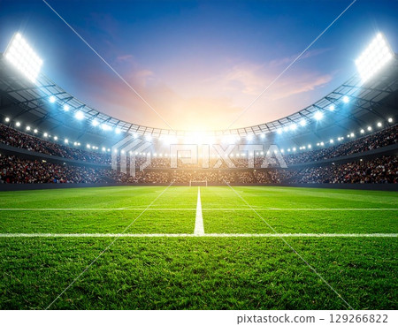日落時分，體育場和綠草如茵的足球比賽的真實景象 129266822