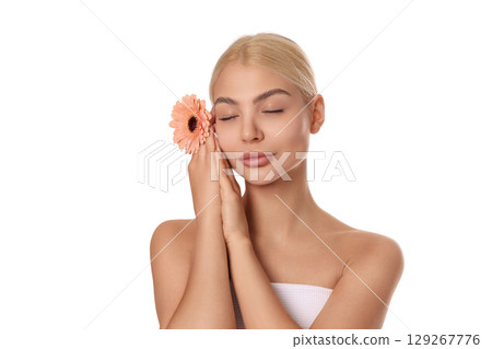 Woman enjoys a moment of tranquility with a flower, isolated on white, PNG 129267776